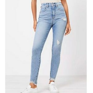 Loft high rise skinny ankle chewed hem distressed light wash jeans.